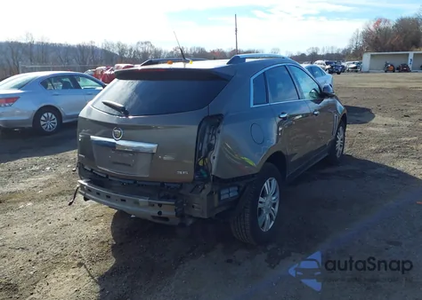 2014 Cadillac Srx Luxury Collection z USA, uszkodzony, nr VIN 3GYFNBE39ES583575